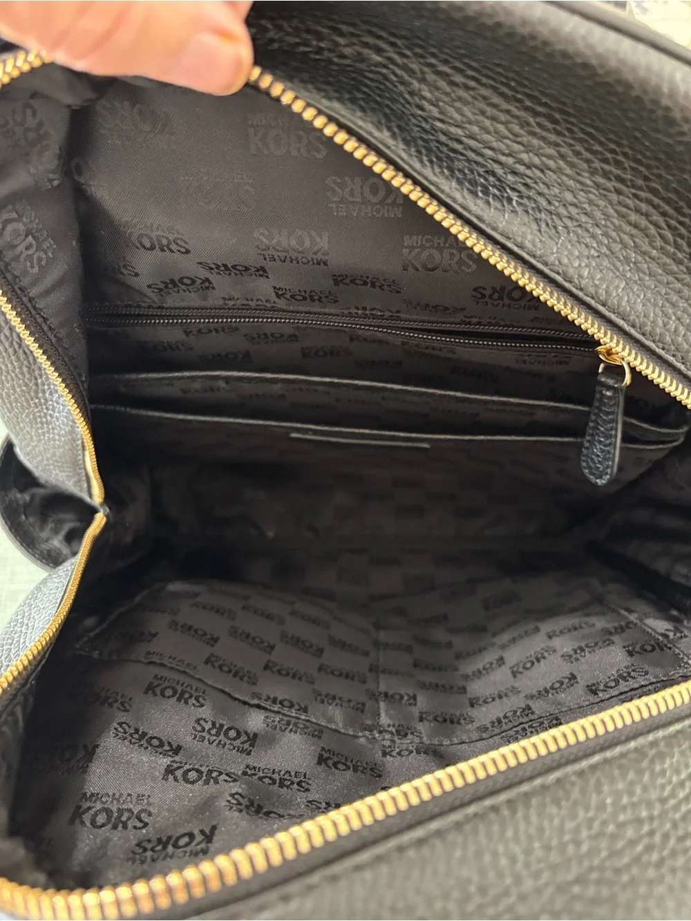 Michael Kors Black Pebbled Leather Small Backpack with Gold Plaque
